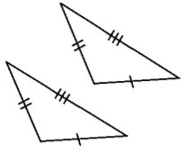 null Two triangles with equal corresponding sides marked, demonstrating congruence.