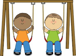 Two children sitting on swings