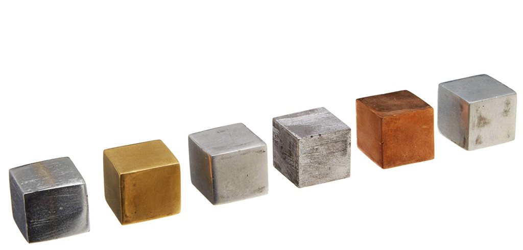 Metal cubes of the same size made of different materials