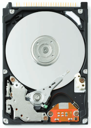 Internal view of a hard disk drive showing platter and read/write mechanism